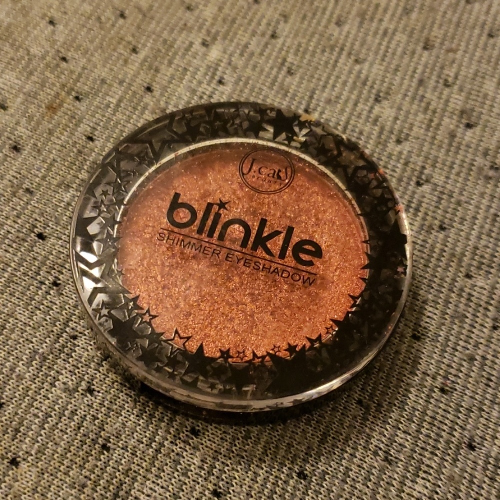 A shimmery red single eyeshadow